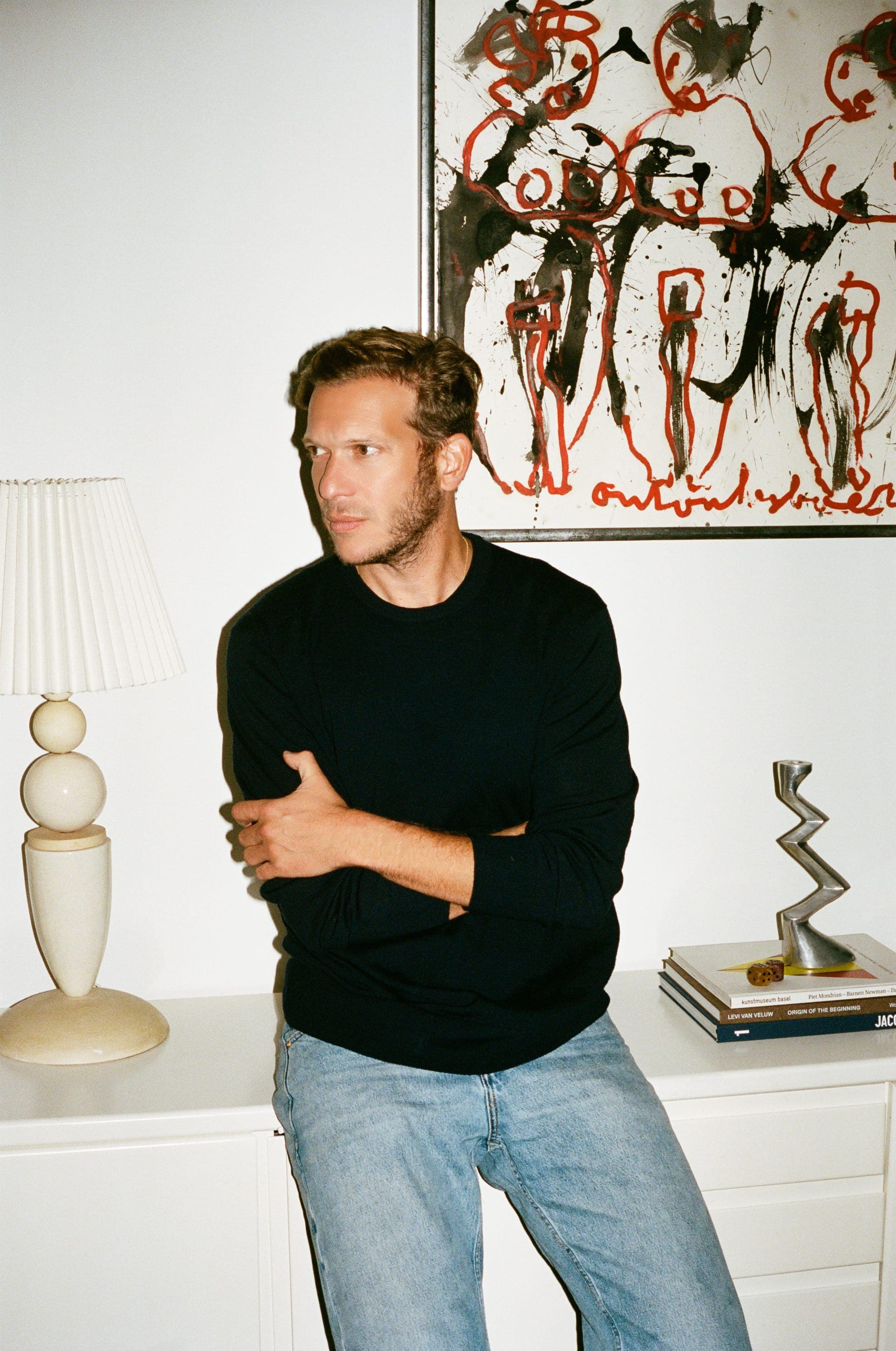 Matthieu Jansen at home, wearing the Crewneck in Midnight