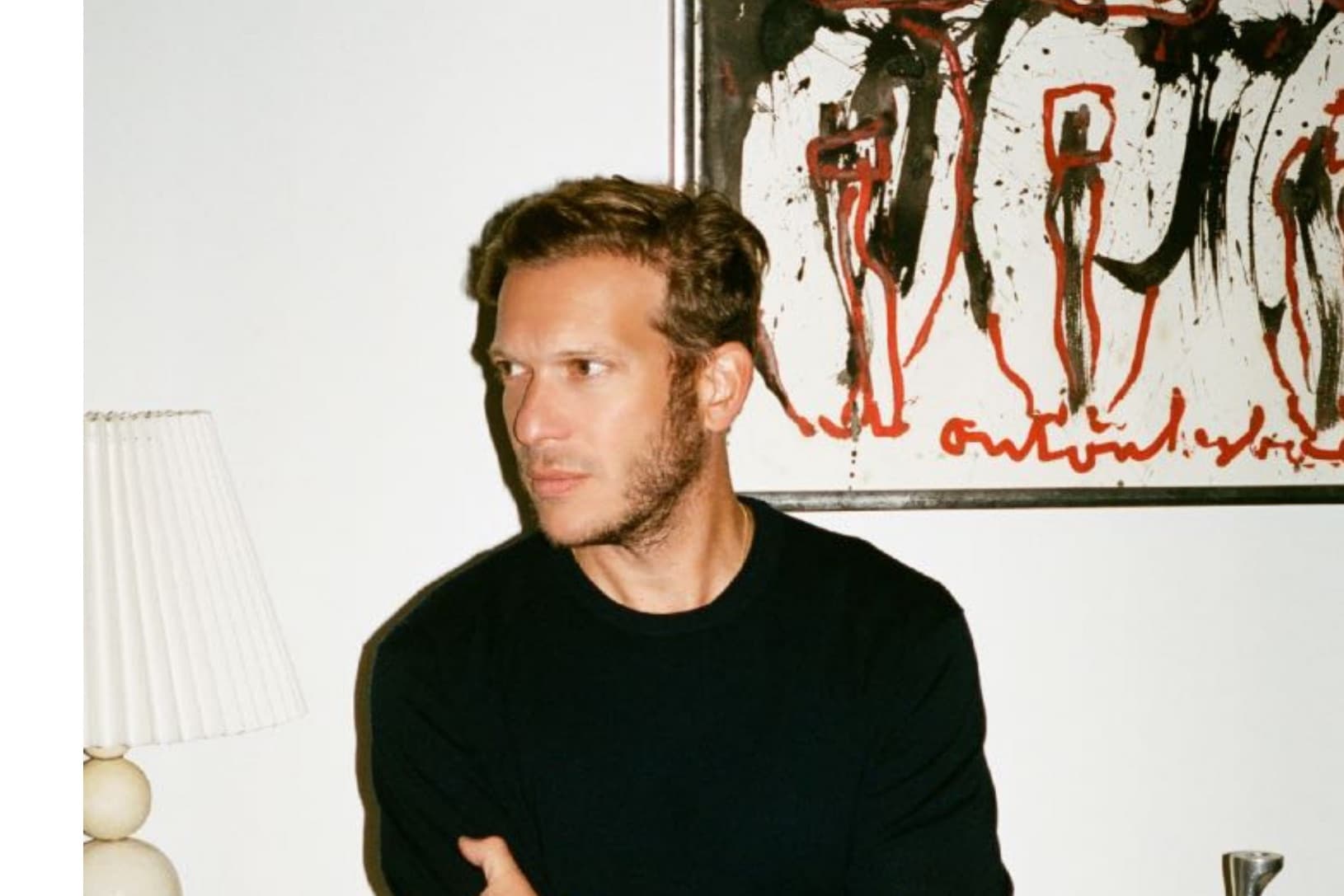 Matthieu Jansen at home, wearing the Crewneck in Midnight