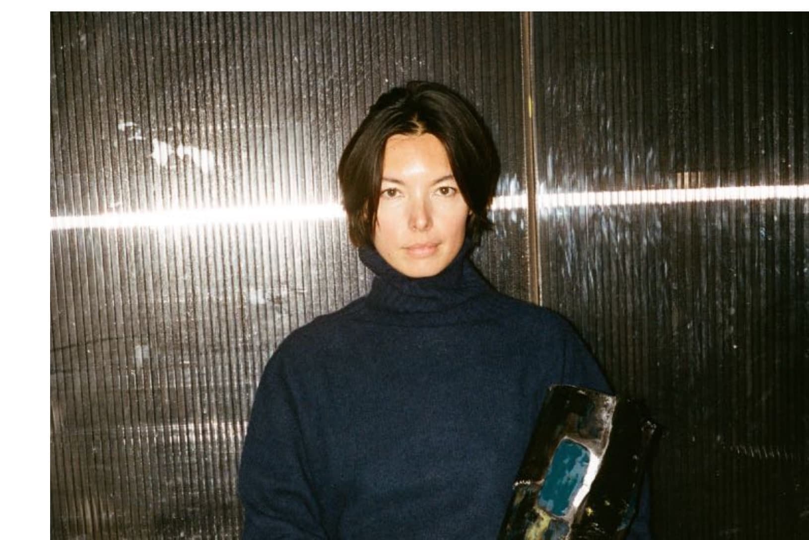 May Liok wearing the Turtleneck in Midnight
